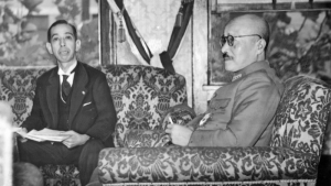 Japan's Minister Nobusuke Kishi with Prime Minister Hideki Tōjō (right), October, 1943. Nobusuke Kishi was later named as Prime Minister and was the grandfather of Prime Minister Shinzo Abe Photo Credit: The Asahi Shimbun Company, Wikipedia Commons.