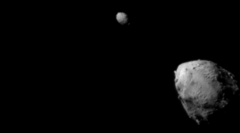 Asteroid Didymos (top left) and its moonlet, Dimorphos, about 2.5 minutes before the impact of NASA’s DART spacecraft. The image was taken by the on board DRACO imager from a distance of 570 miles (920 kilometers). This image was the last to contain a complete view of both asteroids. Didymos is roughly 2,500 feet (780 meters) in diameter; Dimorphos is about 525 feet (160 meters) in length. Didymos’ and Dimorphos’ north is toward the top of the image. Credits: NASA/Johns Hopkins APL