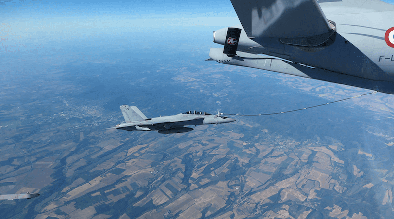 A French Airbus A330 MRTT refuels a U.S. Navy F/A-18F Super Hornet over Lithuania during the NATO-led vigilance activity Neptune Strike 22.2, Oct 17, 2022. The Navy aircraft is attached to Strike Fighter Squadron 103. Photo Credit: US Navy