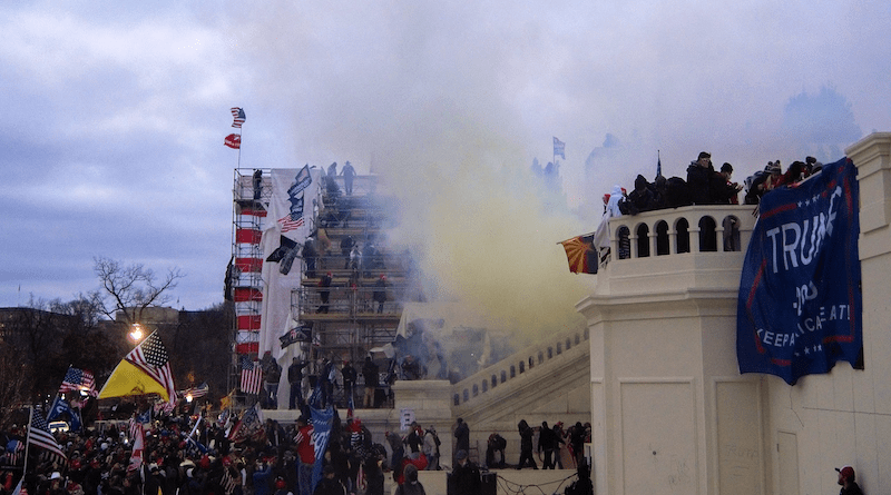 Tear gas outside United States Capitol in Washington D.C. on January 6, 2021 riot. Photo Credit: Tyler Merbler, Wikipedia Commons
