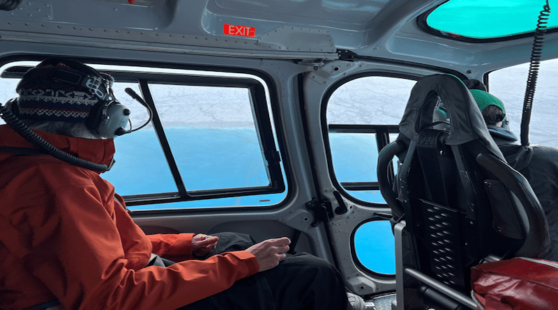 Associate Professor Laura Stevens (right) and co-author Professor Meredith Nettles (left, Columbia University) approach a Greenland supraglacial lake via helicopter. Photo by Marianne Okal (UNAVCO, Inc.).