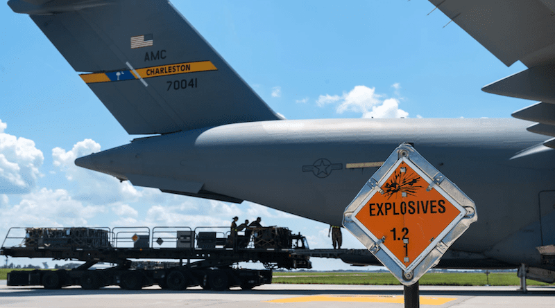 An explosives sign is posted in front of a C-17 Globemaster III during a security assistance mission at Dover Air Force Base, Del., Aug. 9, 2022. The Defense Department is providing Ukraine with security assistance to defend against Russian aggression. Photo Credit: Air Force Airman 1st Class Cydney Lee