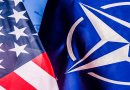 Flags of the United States and NATO. Photo Credit: DOD