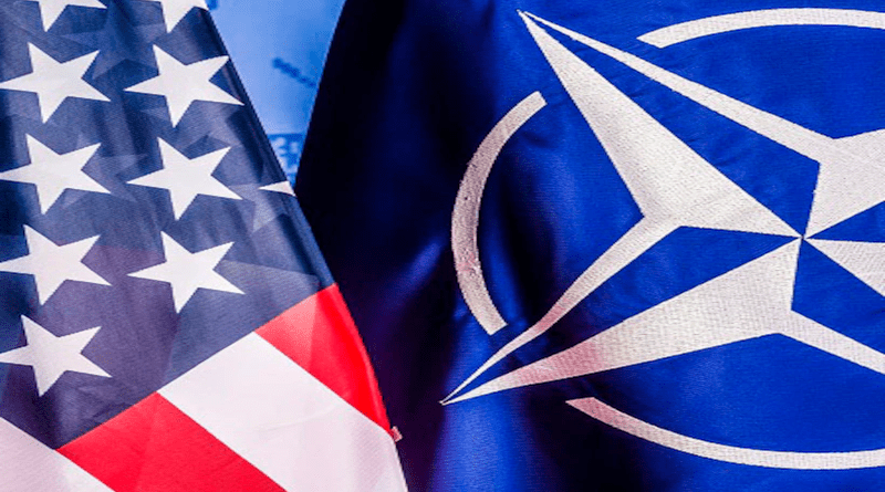 Flags of the United States and NATO. Photo Credit: DOD