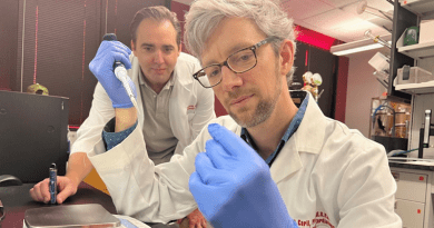 Alex Carll, assistant professor in the UofL Department of Physiology, front, with Matthew Nystoriak, associate professor of medicine. CREDIT: University of Louisville Photo