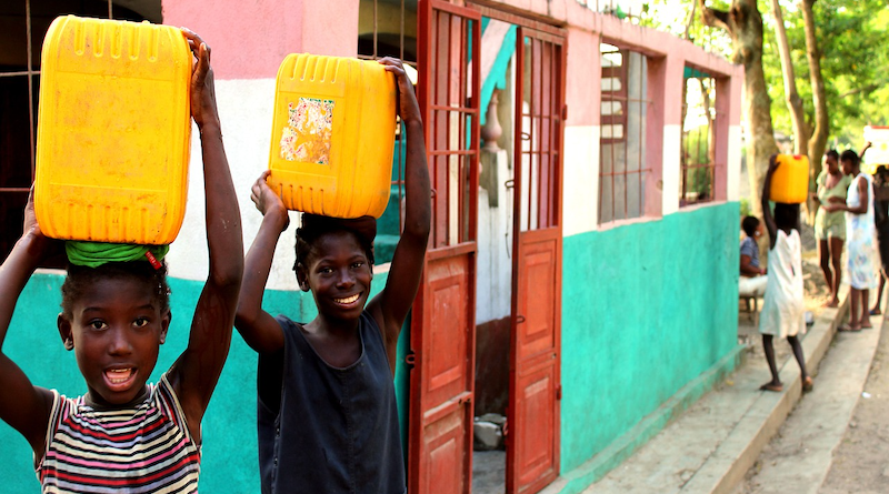 People Outdoors Haiti Together Women Young Happy Water Children