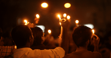 File photo of demonstrators holding candles for a commemoration of the Bangladesh genocide. Photo Credit: Kabir Hossain, Wikipedia Commons
