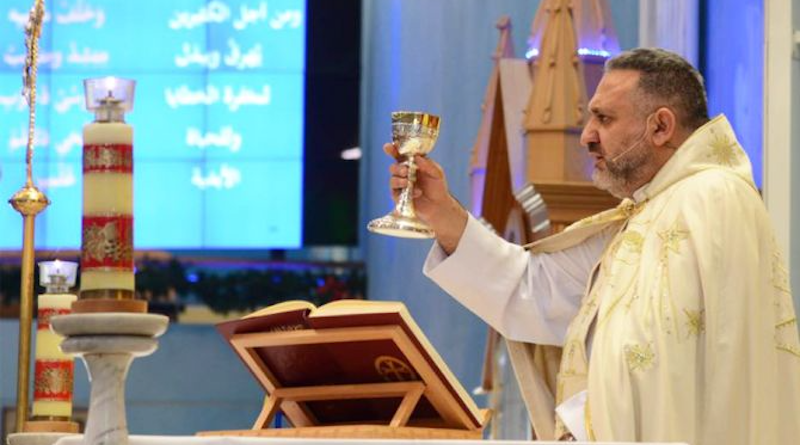 Father Charbel Mhanna offering Mass in Our Lady of the Rosary Church in Doha, Qatar. Photo Credit: Our Lady of the Rosary Church