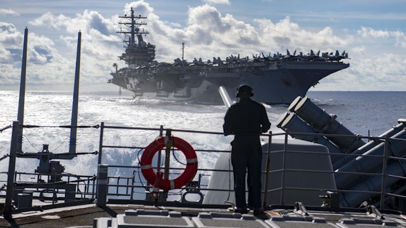 US Navy aircraft carrier USS Ronald Reagan (CVN-76) conducts fueling-at-sea with cruiser USS Chancellorsville (CG 62) in the Philippine Sea on Nov. 22, 2022. Photo Credit: U.S. Navy