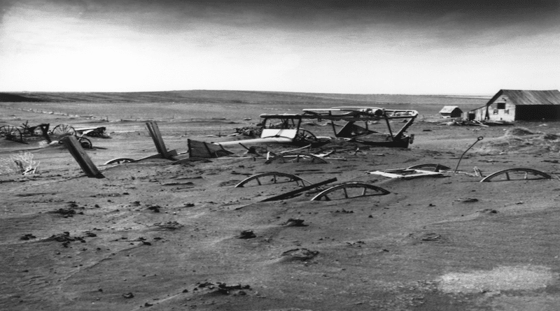 Buried machinery in barn lot in Dallas, South Dakota, United States during the Dust Bowl, an agricultural, ecological, and economic disaster in the Great Plains region of North America in 1936. CREDIT: USDA image no. 00di0971