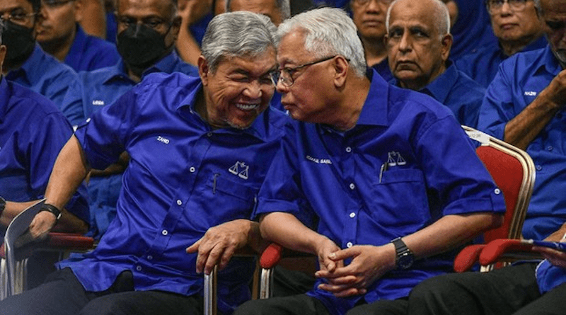 Ahmad Zahid Hamidi, president of the United Malays National Organization party (left), talks with party Vice President Ismail Sabri Yaakob during an event at the Putra World Trade Center in Kuala Lumpur where the party announced its slate of candidates for the upcoming general election, Nov.1, 2022. [S. Mahfuz/BenarNews]