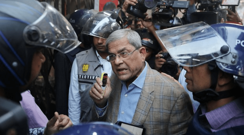 Mirza Fakhrul Islam Alamgir, secretary-general of the Bangladesh Nationalist Party, argues with police as they prevent him from entering the BNP’s national headquarters in Dhaka, Dec. 7, 2022. Photo Credit: BenarNews