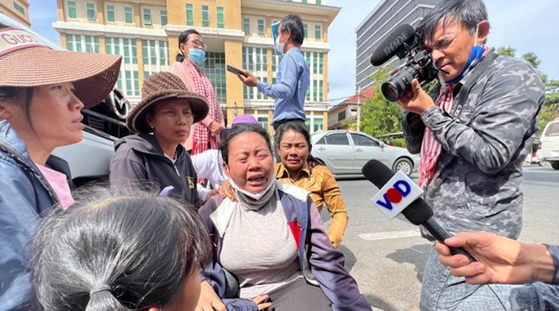 The wives of CNRP activists react after the sentences were announced in Phnom Penh Municipality Court in Cambodia, Thursday, Dec. 22, 2022. Photo Credit: Citizen Journalist, RFA