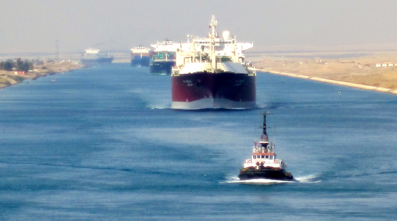 Shipping vessels on the Suez Canal CREDIT: Fabio via Flickr
