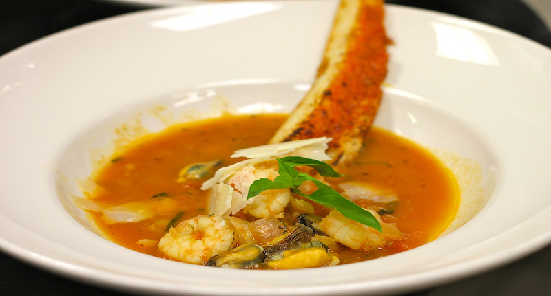 Feast of the Seven Fishes, Second Course: Cioppino with Salmon, Shrimp, Mussels, Clams, Bacalao, Tomato Lobster broth. Photo Credit: GW Fins, Flickr, Wikimedia Commons