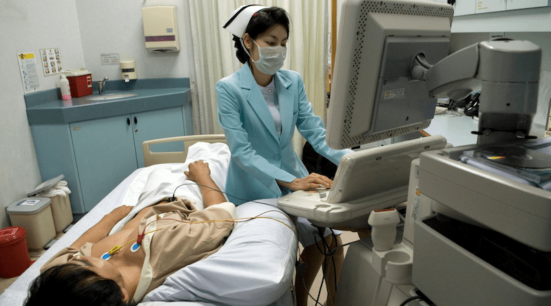 A nurse performing a health examination in a Bangkok hospital. The COVID-19 pandemic has shown the importance of diagnostics in health systems. Copyright: ILO/Thierry Falise. (CC BY-NC-ND 2.0). This image has been cropped.