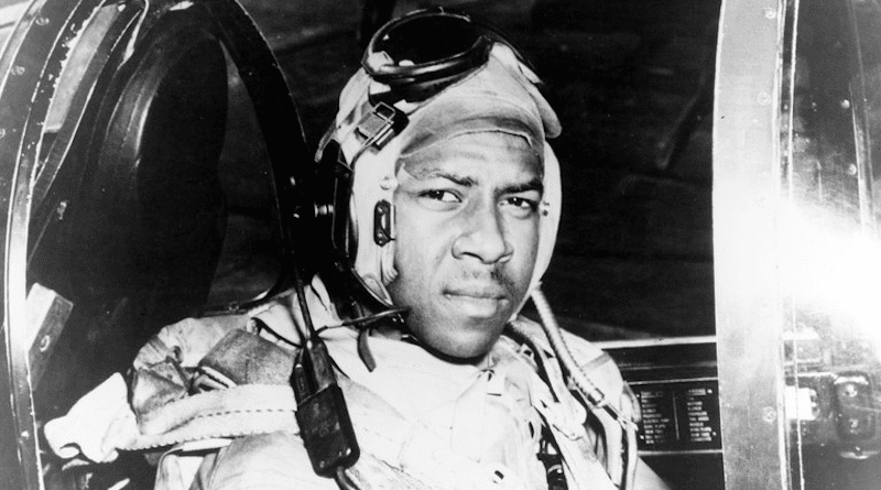 Navy Ensign Jesse L. Brown is seen in the cockpit of an F4U-4 Corsair fighter, circa 1950. Credit: U.S. Navy