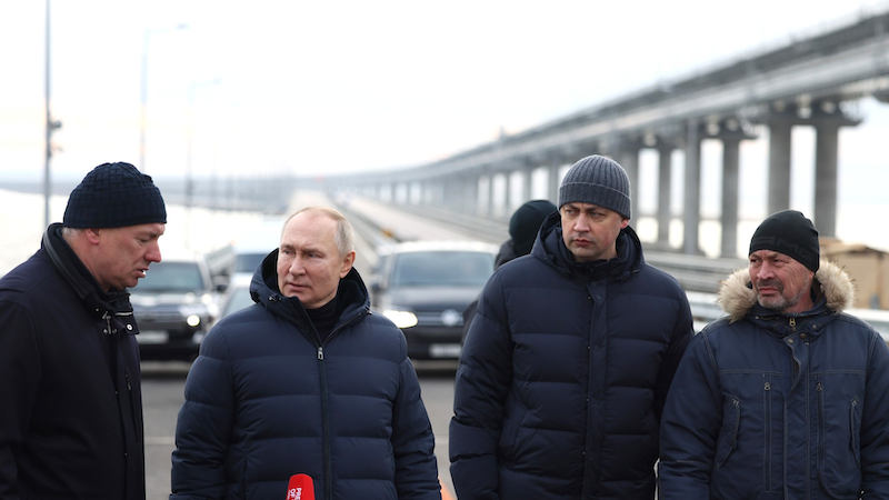 Russia's President Vladimir Putin visit to Crimean Bridge. Deputy Prime Minister Marat Khusnullin, Chief Engineer of the Taman Department of Federal Motorways at the Federal Road Agency Nikita Khrapov, Deputy General Director of Nizhneangarsktransstroy Yevgeny Chibyshev (left to right). Photo Credit: Kremlin.ru