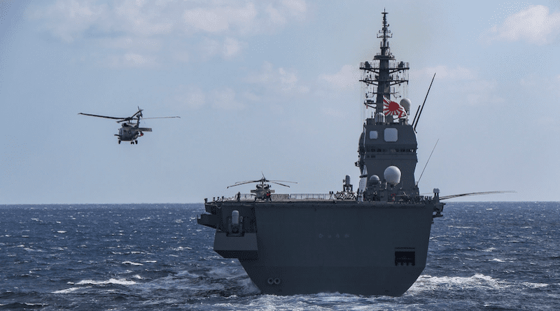 Japanese Maritime Self-Defense Force (JMSDF) Hyūga-class helicopter destroyer JS Hyūga (DDH 181) launches an MH-60J Seahawk helicopter during training. Photo Credit: Intelligence Specialist 1st Class Jeremy Faller