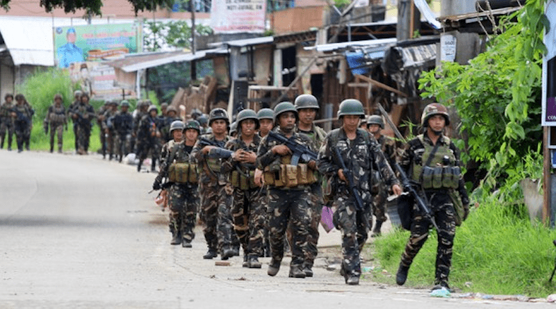 Infantry soldiers patrol the streets of the besieged city of Marawi in the southern Philippines, June 13, 2017, after Islamic State militants took over the city in a daring move. Photo Credit: Jason Gutierrez/BenarNews