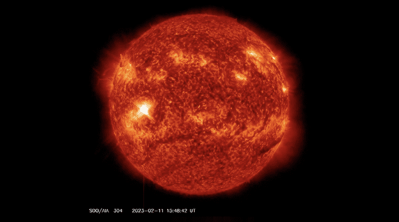 NASA’s Solar Dynamics Observatory captured this image of a solar flare – as seen in the bright flash in the center-left– on Feb. 11, 2023. The image shows a subset of extreme ultraviolet light that highlights the extremely hot material in flares, and which is colorized in red and orange. Credit: NASA/SDO