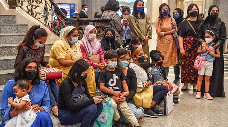 Mothers with their children wait for a court ruling on a citizenship issue at the Palace of Justice in Putrajaya, Malaysia Aug. 5, 2022. [S. Mahfuz/BenarNews]