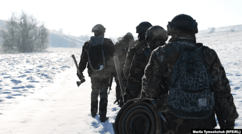 Belarusian recruits for the Kastus Kalinouski Regiment walk through the snowy hills to reach the training ground. Photo Credit: RFE/RL