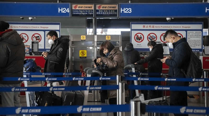 Travelers at an airport in China. Photo Credit: RFA