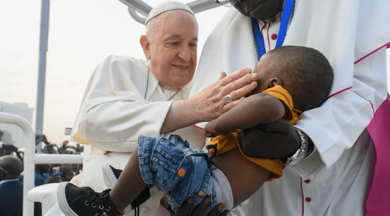 Pope Francis greets a young boy at a Mass in Juba, South Sudan. Photo Credit: Vatican Media