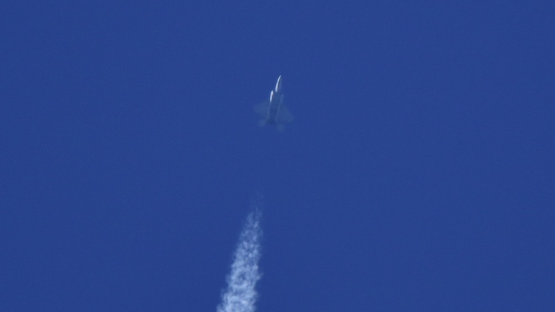 An F-22 Raptor fighter aircraft tracking the Chinese spy balloon on February 4, 2023. Photo Credit: Russotp, Wikipedia Commons