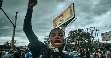 Nigeria people demonstration protest man
