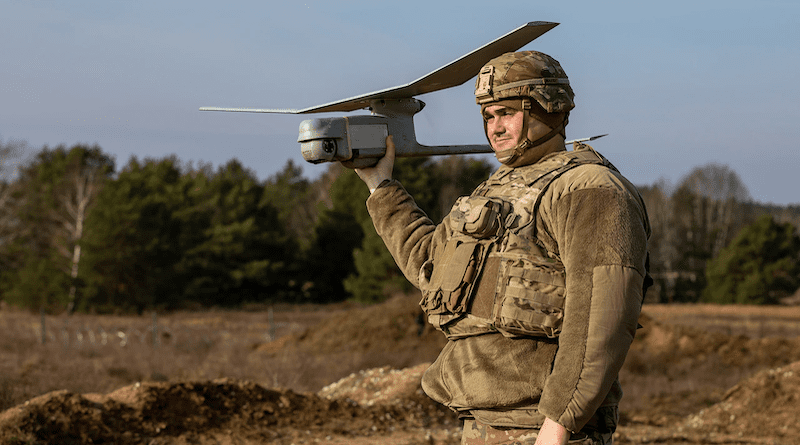 U.S. Army Staff Sgt. Martinez, assigned to 2nd Armored Brigade Combat Team, 1st Cavalry Division, prepares to launch a Raven Small Unmanned Aerial System during a Command Post Exercise at Drawsko Pomorskie Training Area, Poland, Feb. 23, 2023. Photo Credit: Army Pfc. Jacob Nunnenkamp