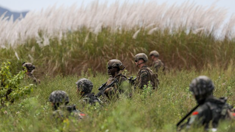 South Korean and U.S. Marines make a beach landing during a joint U.S.-Philippine military exercise in Zambales province, in the northern Philippines, Oct. 7, 2022. Joined by South Korean and Japanese forces, Filipino and American Marines kicked off large-scale military drills amid tensions in the South China Sea and the Taiwan Strait. Photo Credit: Basilio Sepe/BenarNews