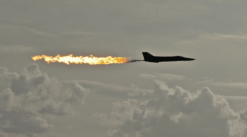 File photo of a RAAF General Dynamics F-111 aircraft performing a dump-and-burn fuel dump. Avalon, Victoria, Australia. Photo Credit: Jjron, Wikipedia Commons