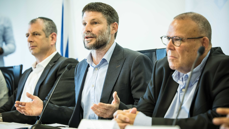 Israel's Minister of Finance and leader of the Religious Zionist Party Bezalel Smotrich (center). Photo Credit: Bezalel Smotrich, Twitter