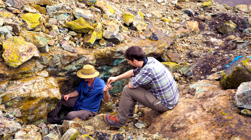 Jay Stephens (right) collects samples of copper ore from a mine in Africa. CREDIT: Photo courtesy Jay Stephens