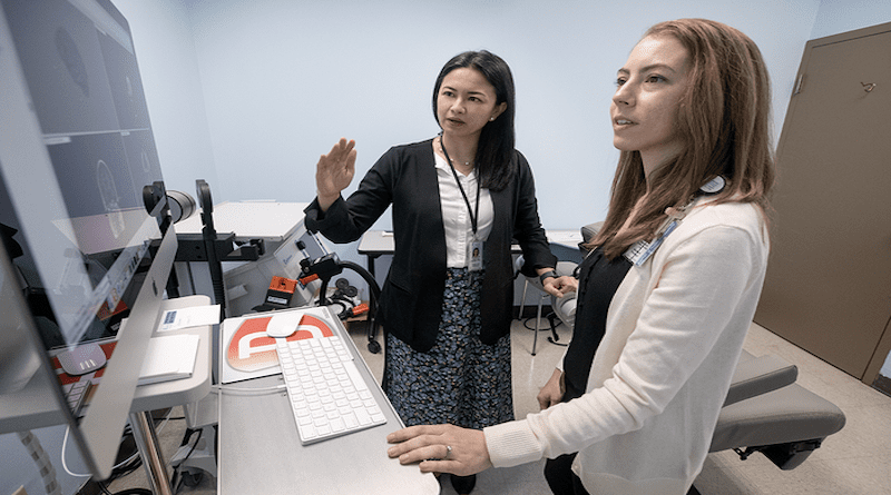 Medical University of South Carolina neuroscientists Dr. Andreana Benitez (in back) and Dr. Stephanie Fountain-Garagoza (in front) discuss a neuroimaging result. CREDIT: Sarah Pack, Medical University of South Carolina