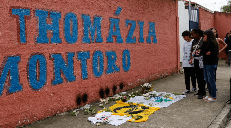Students observe memorial at Thomazia Montoro State School in São Paulo, Brazil. Photo Credit: Fernando Frazao, Agencia Brasil, ABr