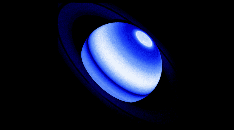 This composite image shows the Saturn Lyman-alpha bulge, an emission from hydrogen which is a persistent and unexpected excess detected by three distinct NASA missions, namely Voyager 1, Cassini, and the Hubble Space Telescope between 1980 and 2017. A Hubble near-ultraviolet image, obtained in 2017 during the Saturn summer in the northern hemisphere, is used as a reference to sketch the Lyman-alpha emission of the planet. The rings appear much darker than the planet's body because they reflect much less ultraviolet sunlight. Above the rings and the dark equatorial region, the Lyman-alpha bulge appears as an extended (30 degree) latitudinal band that is 30 percent brighter than the surrounding regions. A small fraction of the southern hemisphere appears between the rings and the equatorial region, but it is dimmer than the northern hemisphere. North of the bulge region (upper-right portion of image), the disk brightness declines gradually versus latitude toward the bright aurora region that is here shown for reference (not at scale). A dark spot inside the aurora region represents the footprint of the spin axis of the planet. It's believed that icy rings particles raining on the atmosphere at specific latitudes and seasonal effects cause an atmospheric heating that makes the upper atmosphere hydrogen reflect more Lyman-alpha sunlight in the bulge region. This unexpected interaction between the rings and the upper atmosphere is now investigated in depth to define new diagnostic tools for estimating if distant exoplanets have extended Saturn-like ring systems. CREDIT: NASA, ESA, Lotfi Ben-Jaffel (IAP & LPL)
