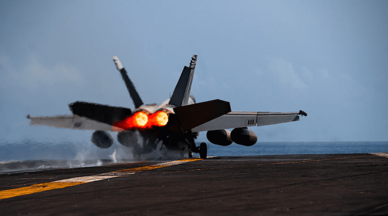 An F/A-18F Super Hornet from the “Fighting Redcocks” of Strike Fighter Squadron 22 launches from the flight deck of the aircraft carrier USS Nimitz in the East China Sea, April 7, 2023. Photo Credit: Navy Petty Officer 2nd Class Joseph Calabrese