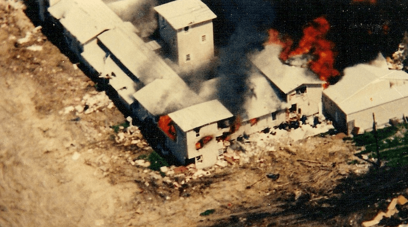 The Mount Carmel Center in Waco, Texas engulfed in flames on April 19, 1993. Photo Credit: FBI, Wikipedia Commons