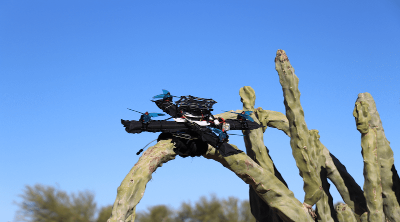 Arizona State University Associate Professor Wenlong Zhang and his team have developed a first-of-its kind quadrotor drone with both an inflatable frame to enable resilience to collisions and an innovative gripper than enables the device to securely perch on almost any surface. CREDIT: Arizona State University