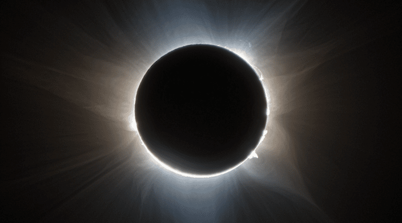 The Citizen CATE 2024 project produced this false color image of the solar corona during the 2023 total solar eclipse from Exmouth, Western Australia. The image combines two crossed polarization angles, indicated by color. Prominences, loops and streamers are easily visible in this high-resolution image. CREDIT: SwRI/Citizen CATE 2024/Dan Seaton