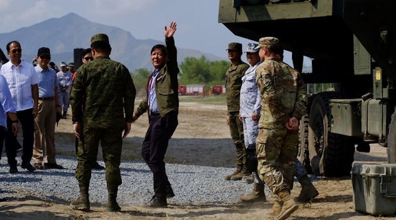 Philippine President Ferdinand Marcos Jr. waves after inspecting a weapons system at a military base in San Antonio, Zambales province, Philippines, April 26, 2023. Photo Credit: Jason Gutierrez/BenarNews