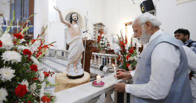 India's PM Narendra Modi lighting a candle at Delhi's Sacred Heart Cathedral Catholic Church on the occasion of Easter, in New Delhi on April 9, 2023. Photo Credit: PM India Office