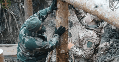 Ukrainian soldiers building a trench. Photo Credit: Ukraine Defense Ministry