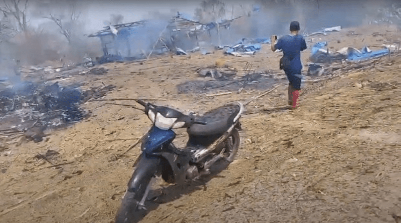 In this image grab from a video, a building burns in the aftermath of the Myanmar junta’s shelling and airstrikes on Pa Zi Gyi village, Kanbalu township, Sagaing region on Tuesday, April 11, 2023. Photo Credit: Citizen journalist, RFA