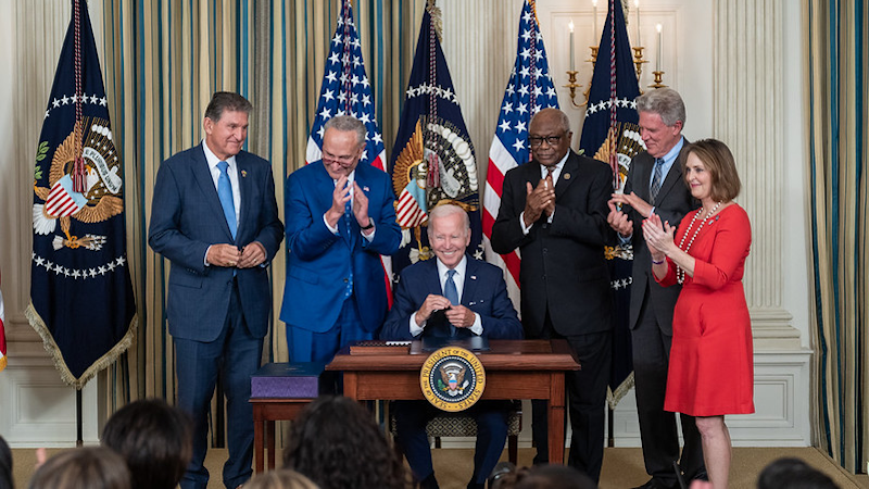 President Joe Biden signs H.R. 5376, the “Inflation Reduction Act of 2022”, Tuesday, August 16, 2022, in the State Dining Room of the White House. (Official White House Photo by Cameron Smith)