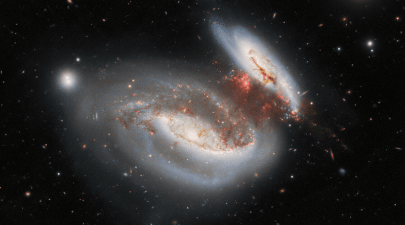 The Gemini North telescope, one half of the International Gemini Observatory, operated by NSF’s NOIRLab, captured this dazzling image of the so-called Taffy Galaxies — UGC 12914 and UGC 12915. Their twisted appearance is the result of a head-on collision that occurred about 25 million years prior to their appearance in this image. A bridge of highly turbulent gas devoid of significant star formation spans the gap between the two galaxies. CREDIT International Gemini Observatory/NOIRLab/NSF/AURA Image Processing: M. Rodriguez (NSF’s NOIRLab), T.A. Rector (University of Alaska Anchorage/NSF’s NOIRLab), J. Miller (Gemini Observatory/NSF’s NOIRLab), M. Rodriguez (Gemini Observatory/NSF’s NOIRLab), M. Zamani (NSF’s NOIRLab) & D. de Martin (NSF’s NOIRLab) Acknowledgment: PI: A. S. Castelli (Universidad Nacional de la Plata)