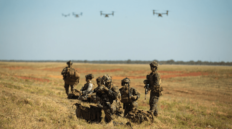 Marines establish defensive positions as MV-22 Ospreys approach for landing during Exercise Koolendong 22 at Royal Australian Air Force Base Curtin in Australia, July 18, 2022. Photo Credit: Marine Corps Cpl. Cedar Barnes